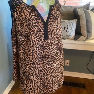 Woman’s cheetah print blouse